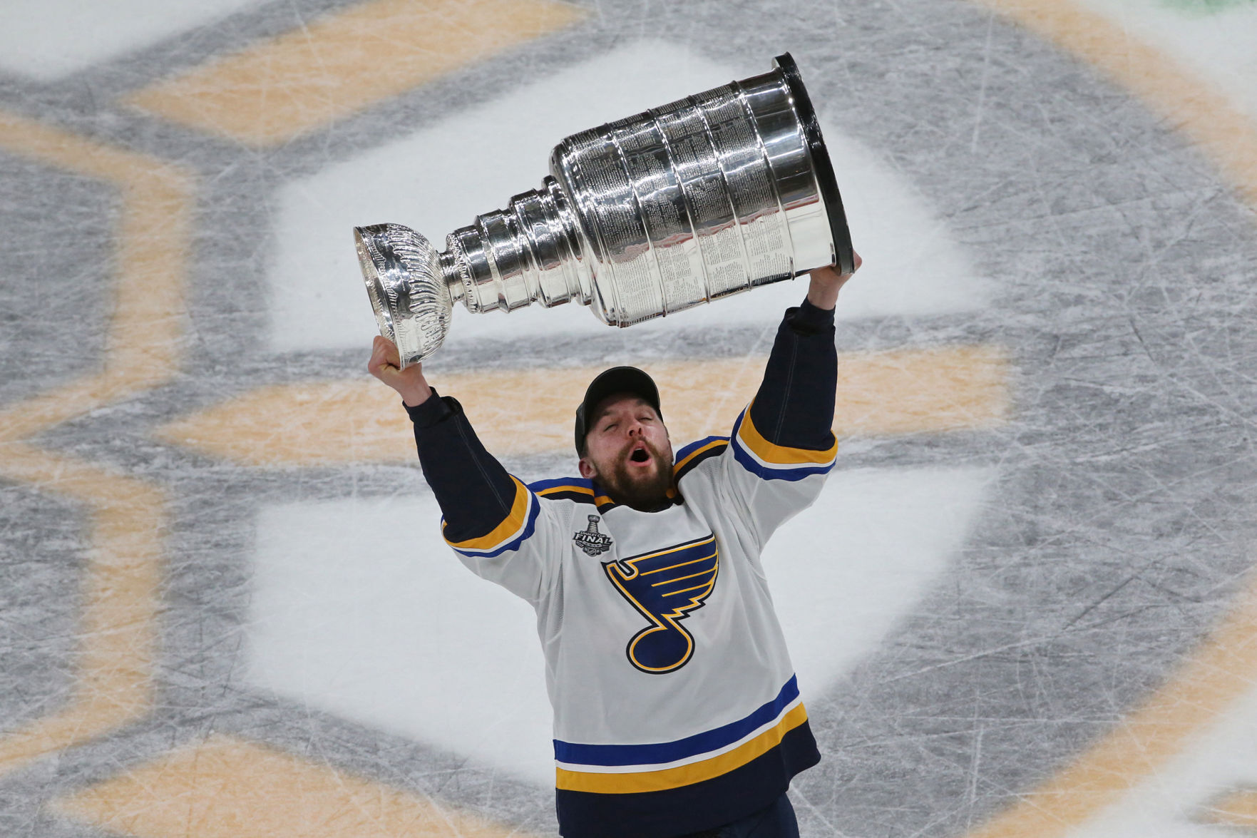 Blues David Perron celebrates with the Cup